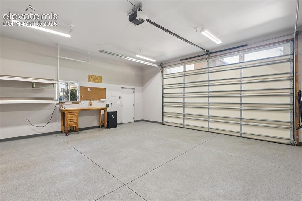 Image 32 of 32: Detached Garage Interior with oversized 10