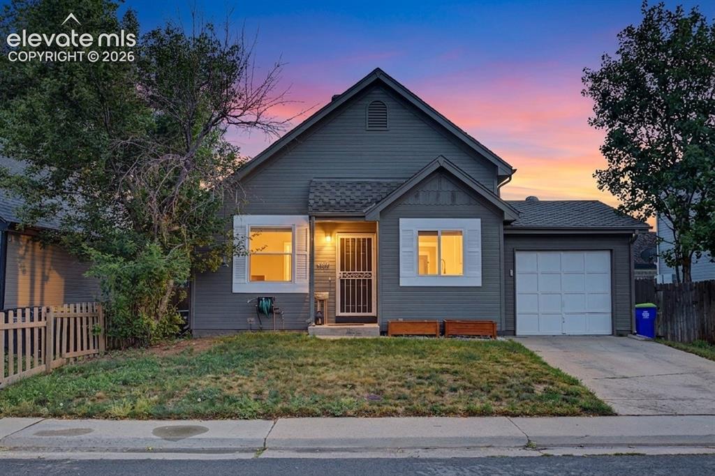 Image 1 of 37: Single-family residence featuring gray siding and white trim accents