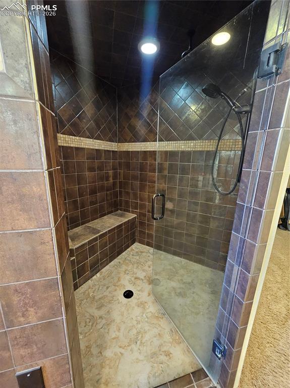 Image 15 of 48: Full bath with a shower stall and recessed lighting
