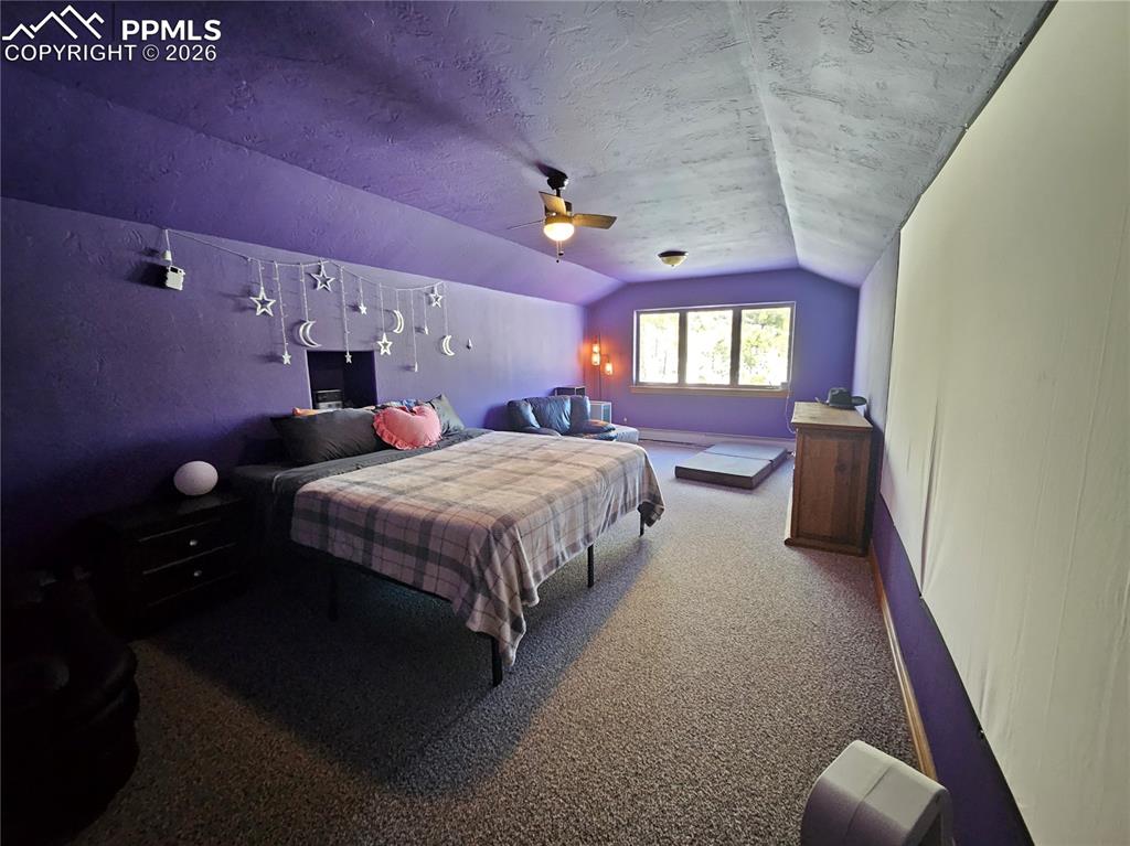 Image 23 of 48: Bonus room featuring carpet floors and a ceiling fan - currently used as no