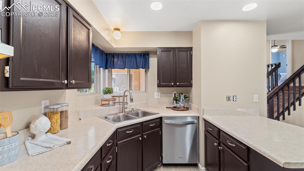 Image 11 of 38: Kitchen is conveniently located adjacent to the dining room and living room