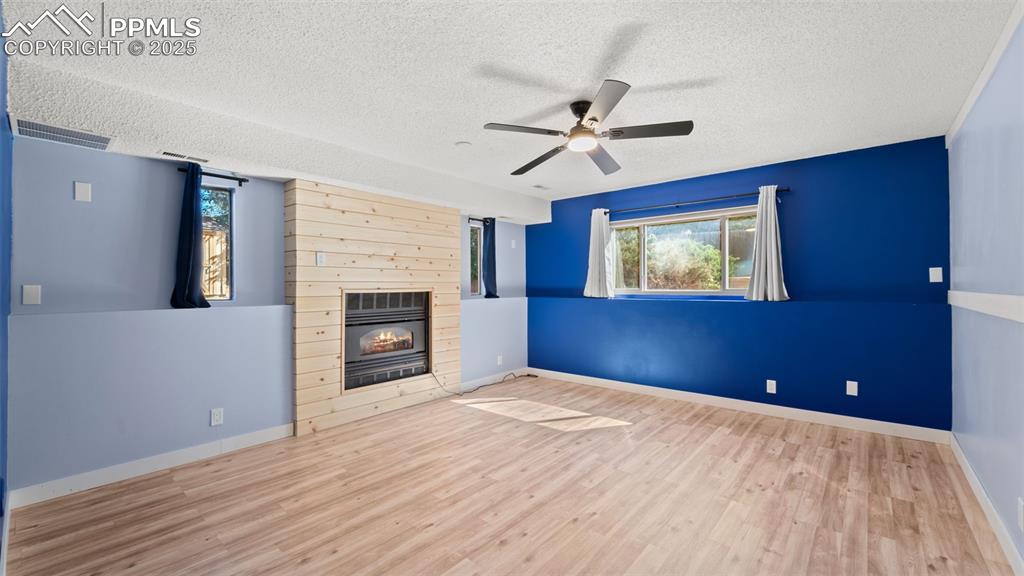 Image 21 of 38: Lower level rec room provides a great space for family activities