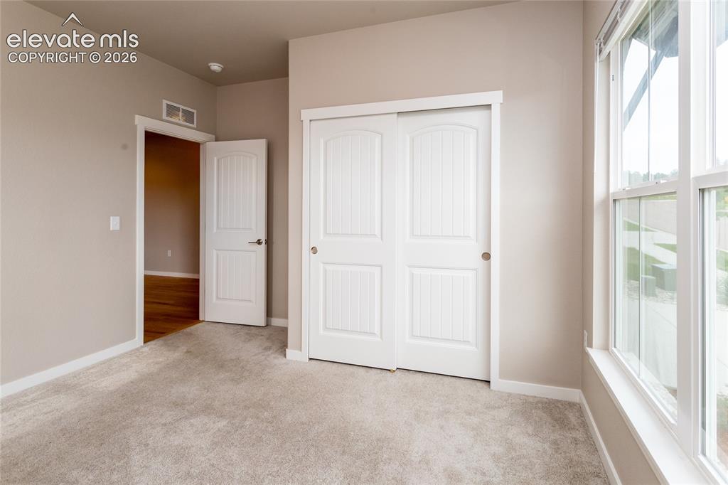 Image 15 of 38: Bedroom