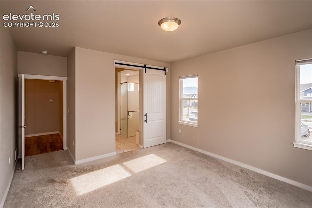 Image 19 of 38: Bedroom