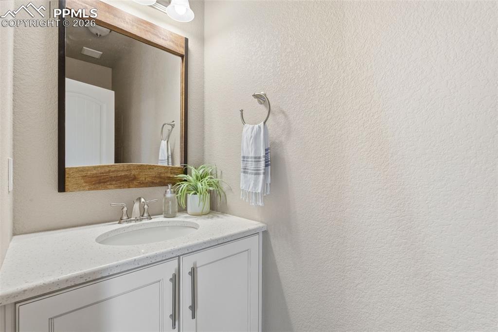 Image 15 of 47: Main Level Powder Bath