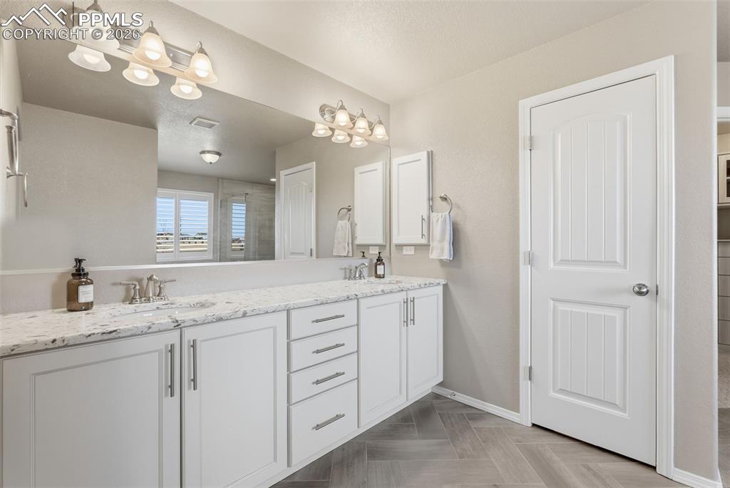 Image 19 of 47: Primary Bathroom