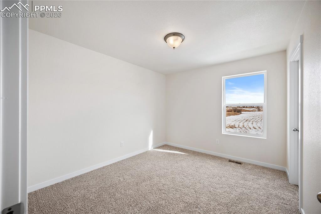 Image 32 of 34: Bedroom