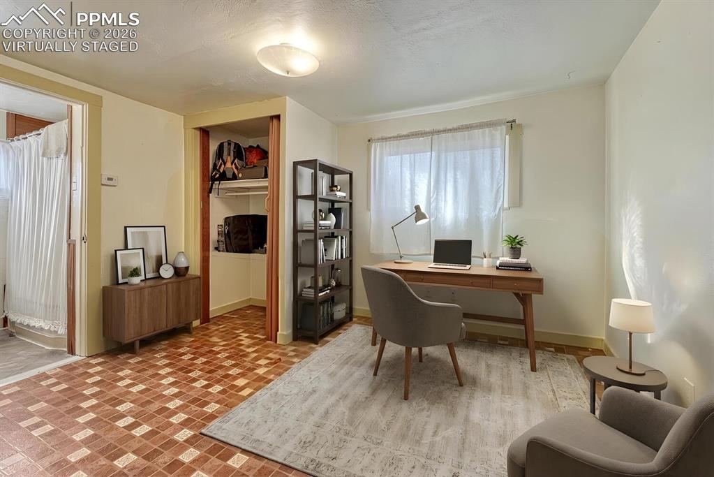 Image 18 of 31: Office virtually staged