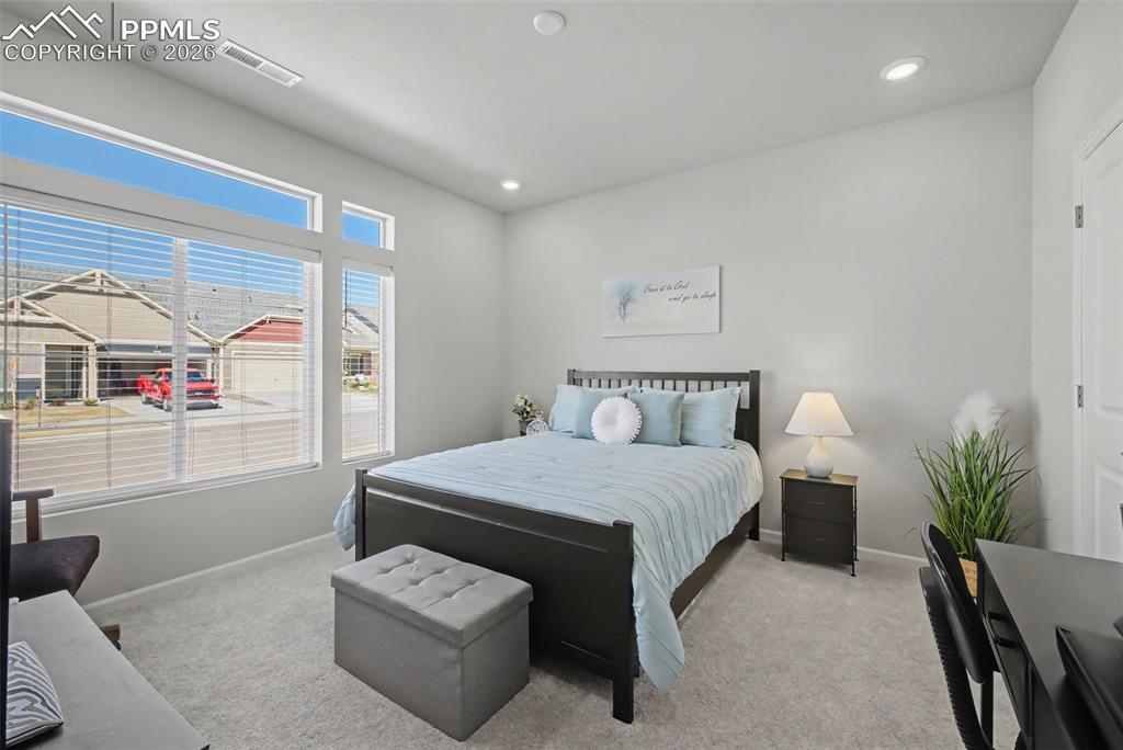 Image 22 of 30: fRONT BEDROOM