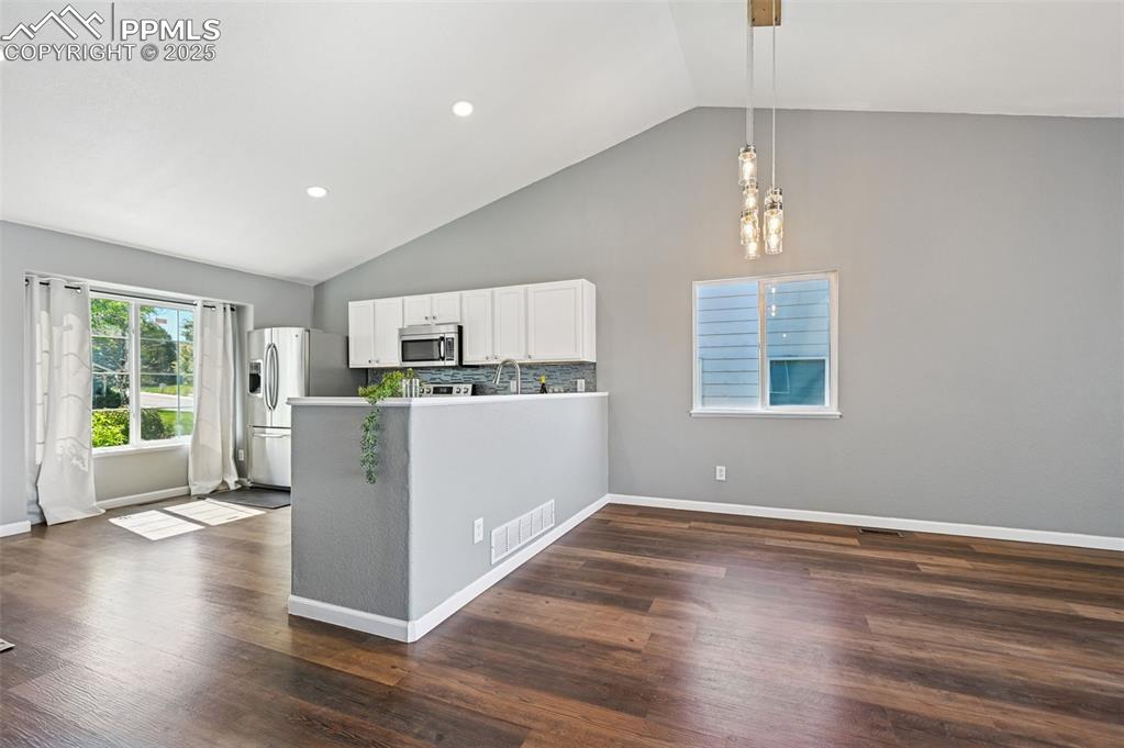 Image 21 of 40: Dining area and kitchen view