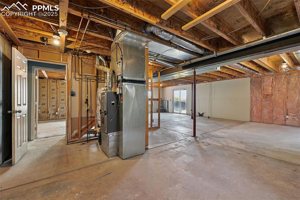 Image 36 of 40: unfinished full basement