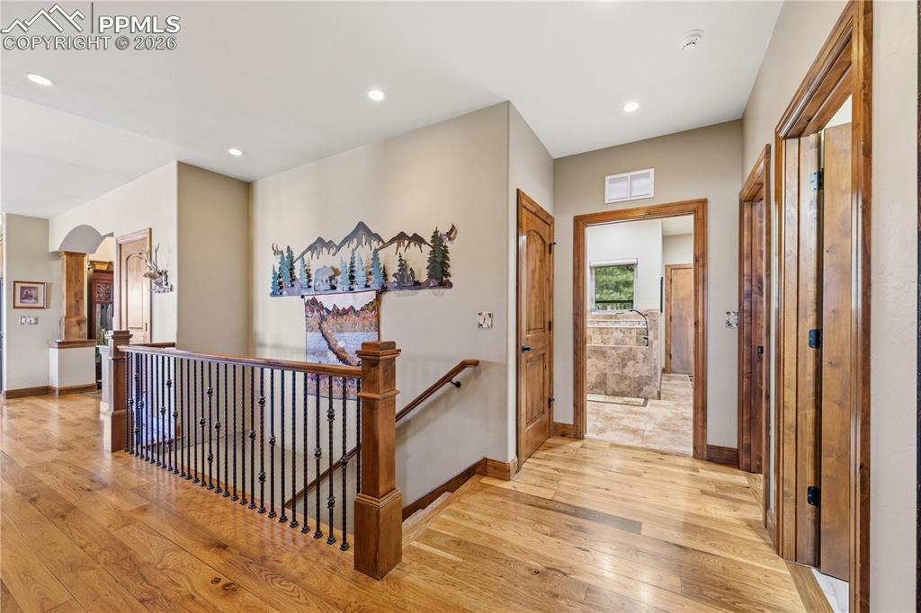 Image 15 of 45: Looking toward garage entry into laundry/mud room and stairs to basement