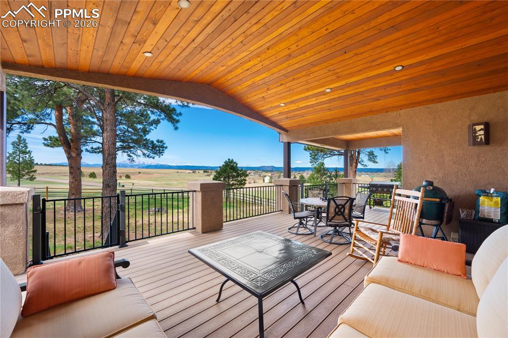 Image 36 of 45: Covered composite deck with unobstructed views