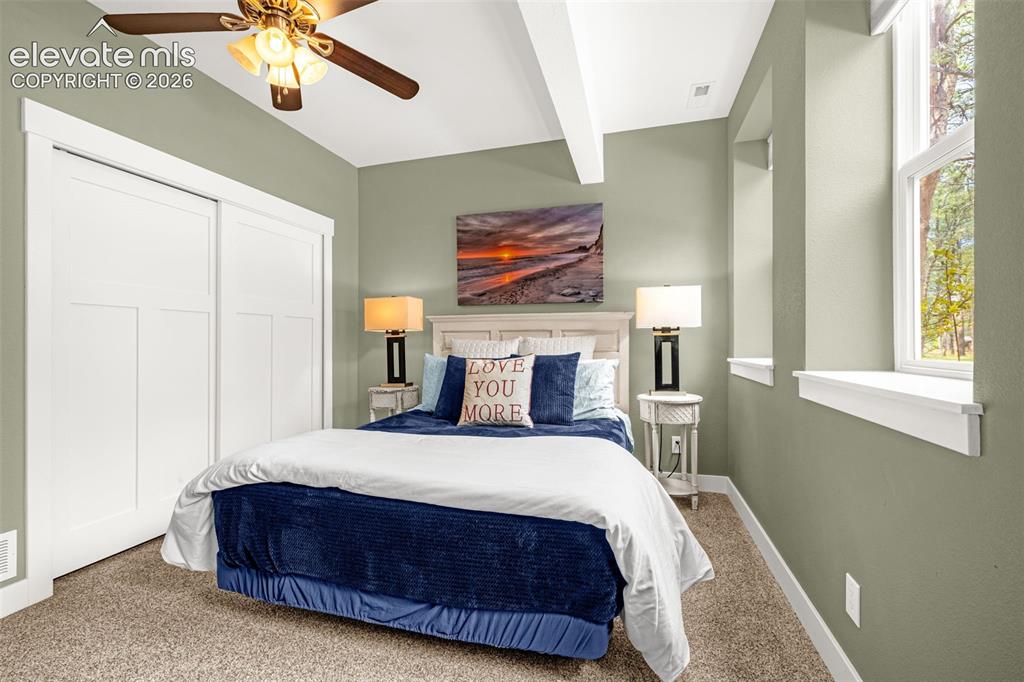 Image 31 of 49: Multipurpose basement living area/family room