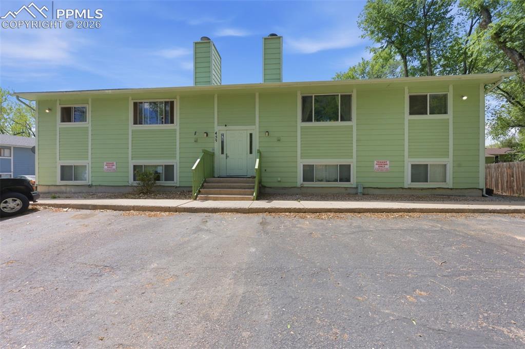 Caption: Front with plenty of parking spaces
