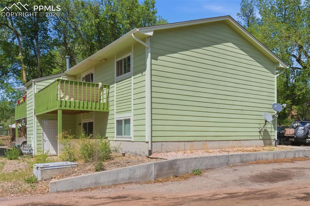 Image 24 of 26: Upper two units have decks, lower two units have walk-outs.