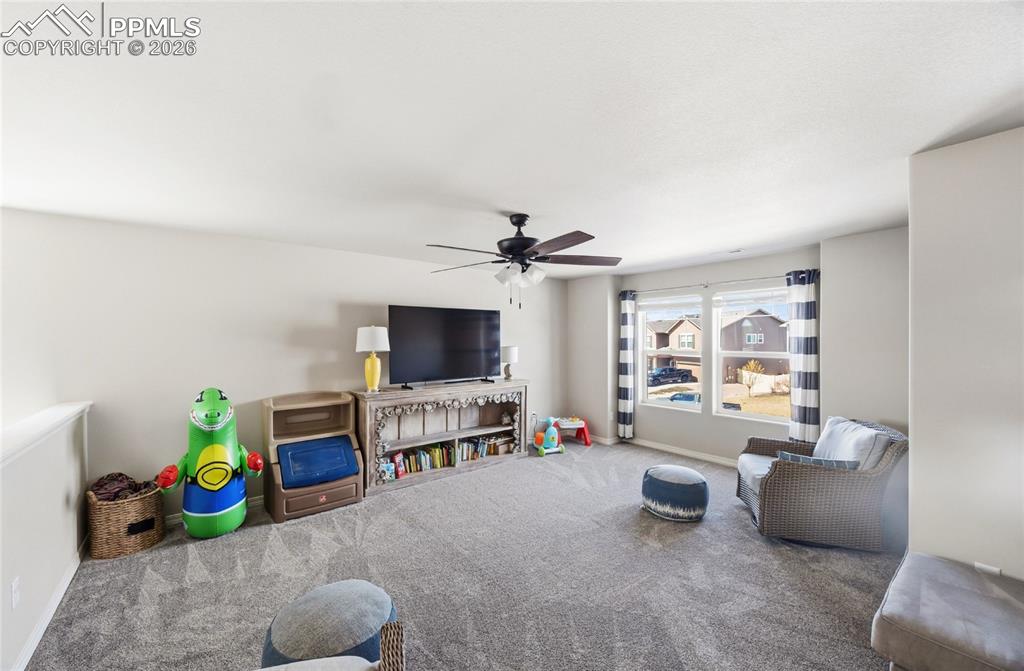 Image 17 of 41: Stainless steel appliances include a cooktop, built-in microwave oven, doub