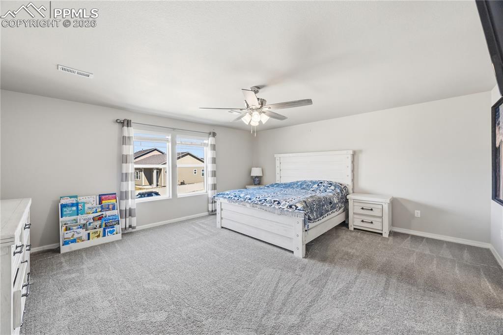 Image 24 of 41: Upper Level Bedroom #2 also has a walk in closet.