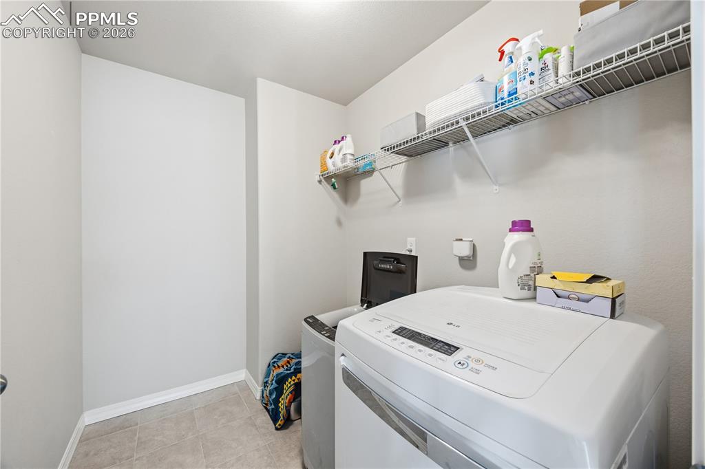 Image 33 of 41: Walk in closet in the Primary Bathroom.