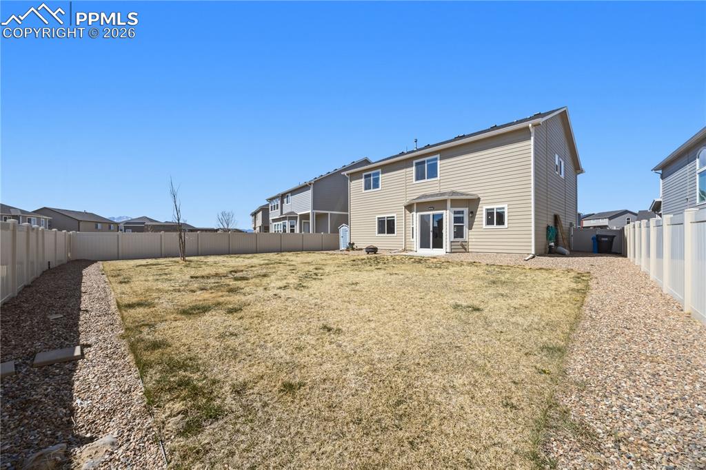 Image 34 of 41: Soaking tub with tile surround in the Primary Bathroom.