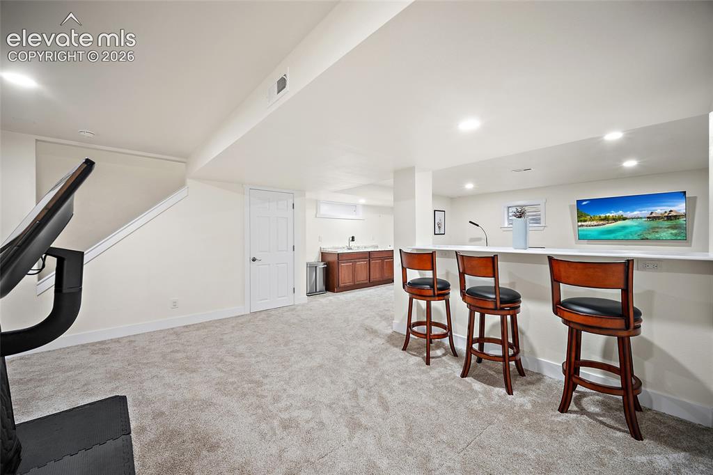 Image 15 of 34: Finished basement