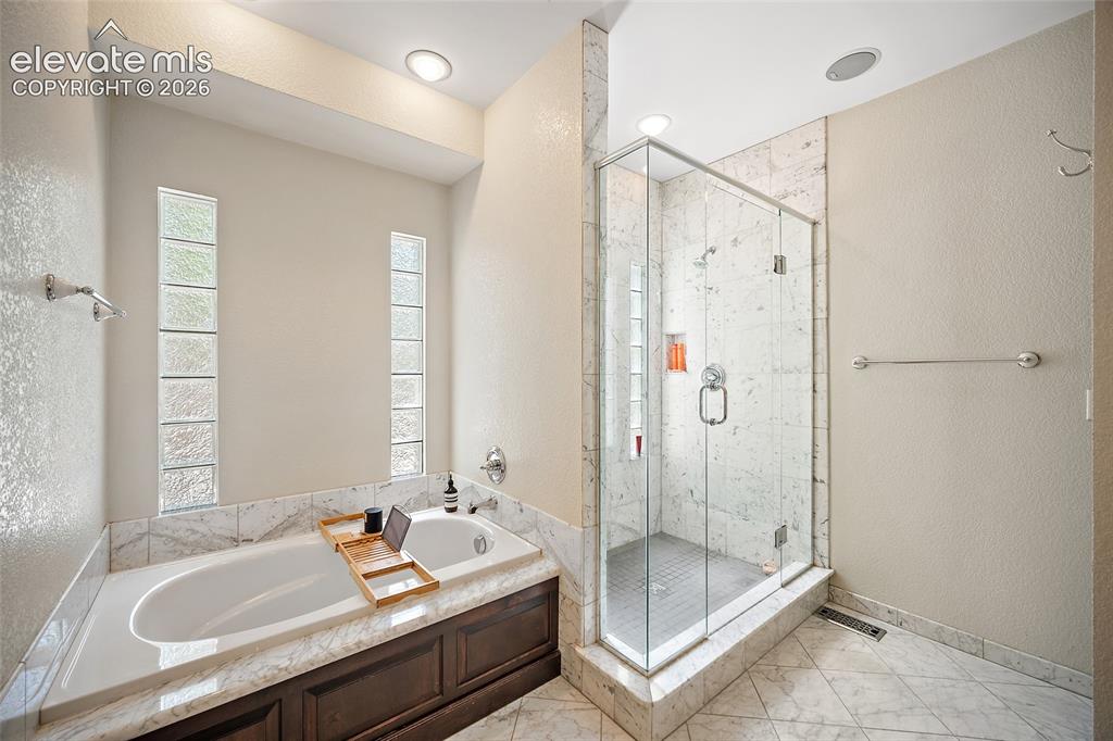 Image 9 of 34: Primary Bathroom
