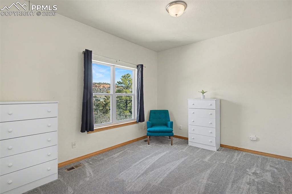 Image 23 of 48: Main level bedroom