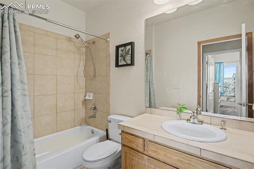 Image 25 of 48: Main level bedroom