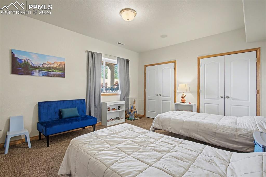 Image 35 of 48: Basement bedroom