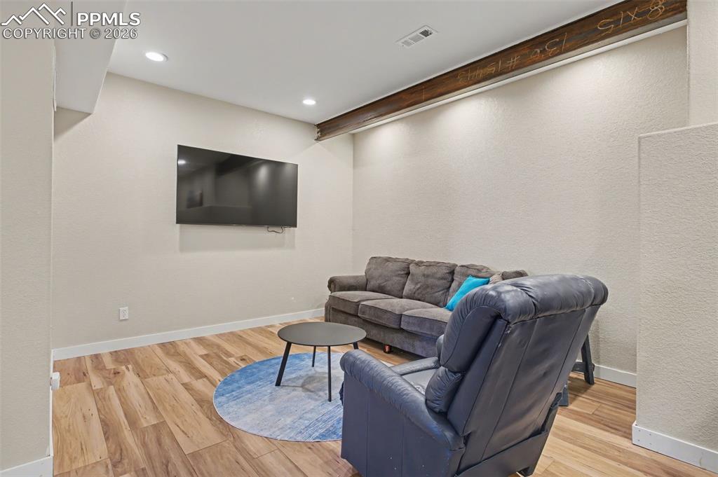 Image 38 of 48: Basement bedroom