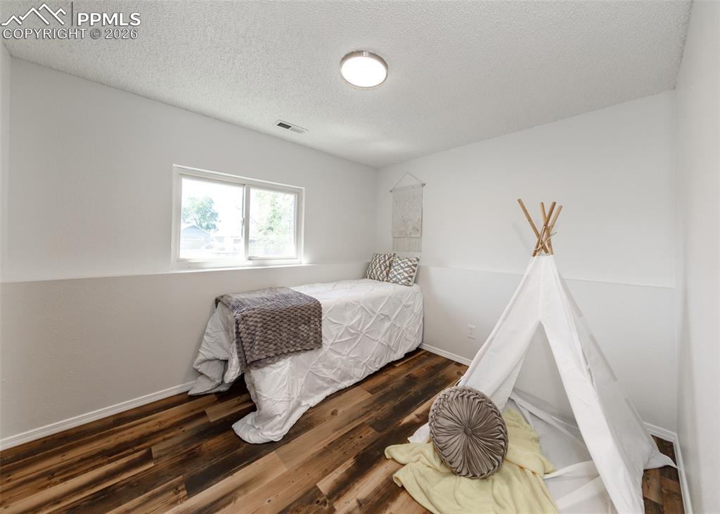 Image 23 of 38: Bedroom