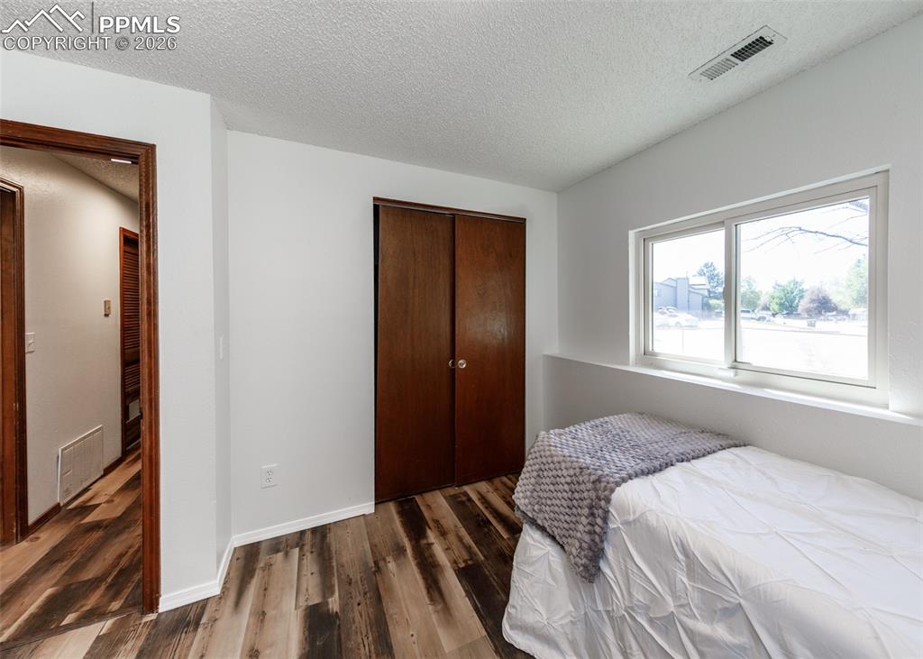 Image 24 of 38: Bedroom