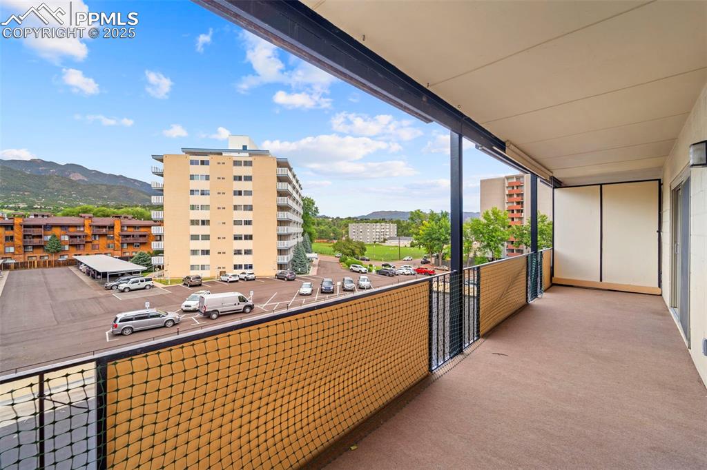 Image 21 of 23: Balcony with a mountain view
