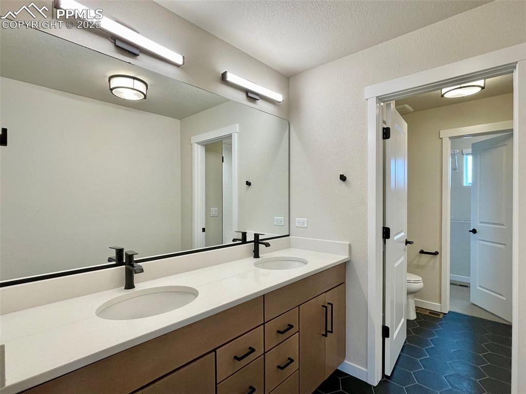 Image 12 of 28: Master Bathroom