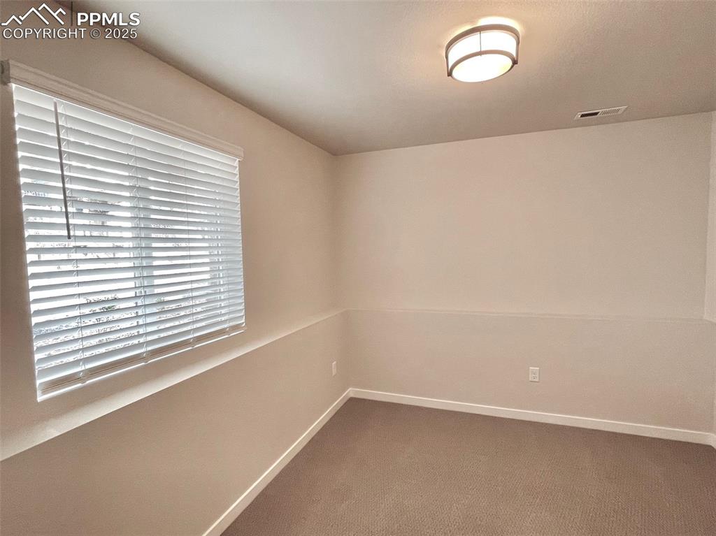 Image 26 of 28: Bedroom