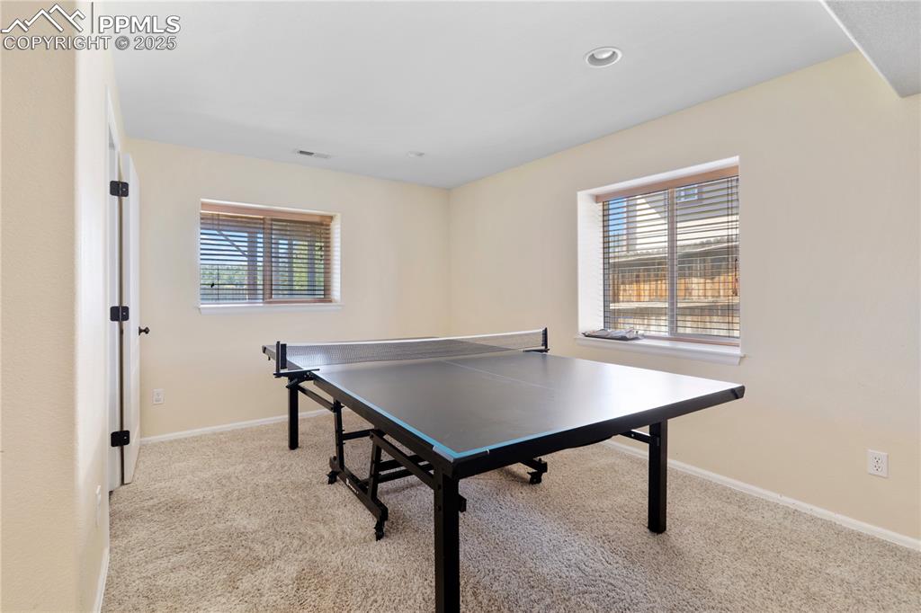 Image 18 of 37: Room for ping pong or billiards!