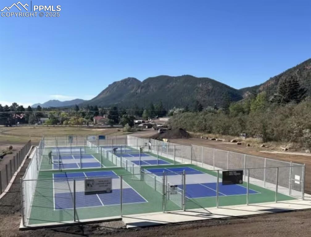 Image 37 of 37: Walk to the pickleball courts!  Unlimited year-round recreation!