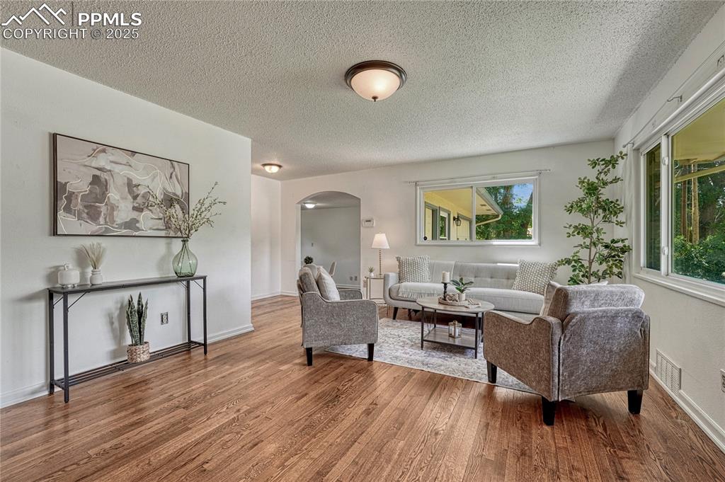 Image 4 of 43: Hardwood flooring through the living room and bedrooms
