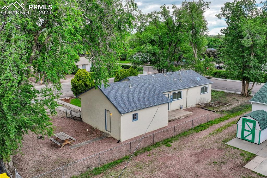 Image 8 of 43: Aerial view of backyard and side yards