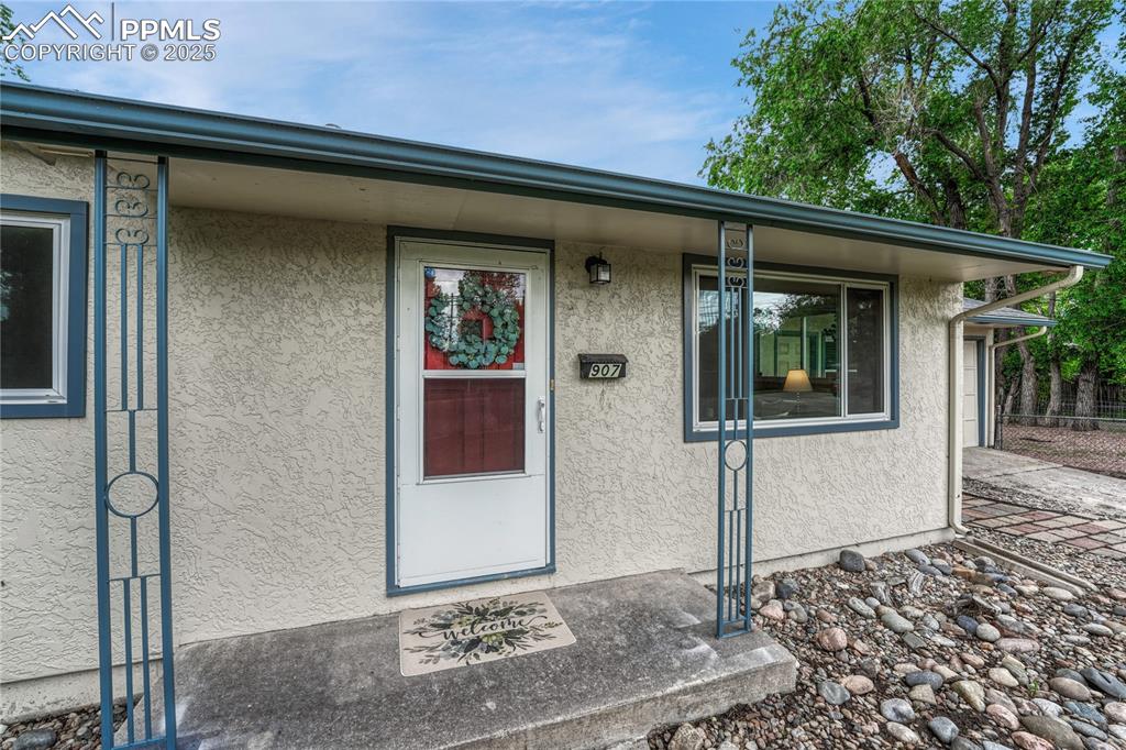 Image 9 of 43: Covered front porch