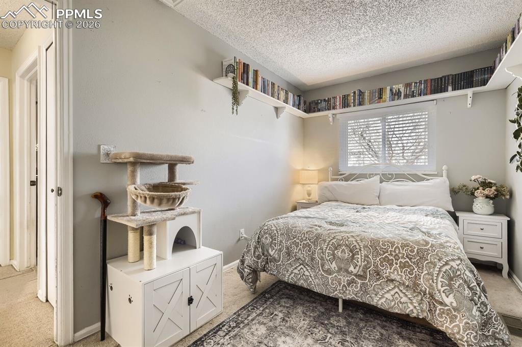 Image 6 of 17: Upstairs bedroom