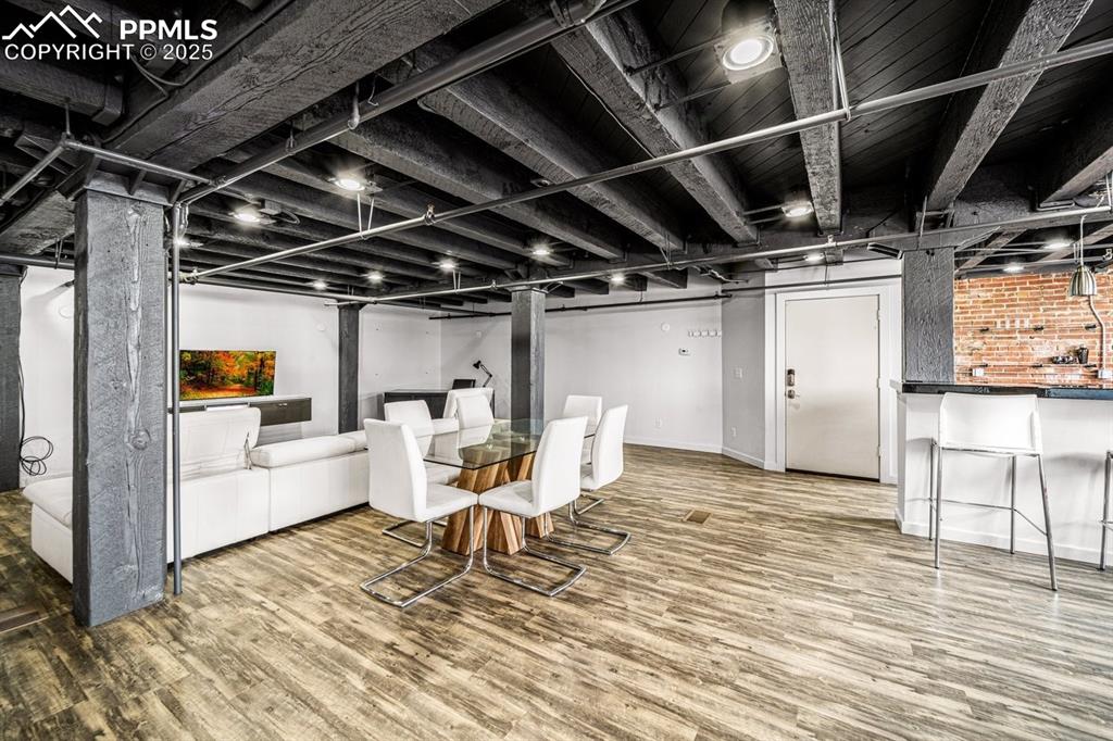Image 8 of 32: featuring wood finished floors and baseboards