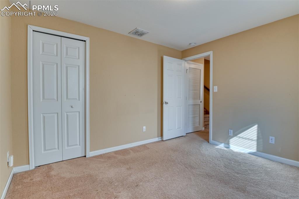 Image 28 of 50: basement bedroom