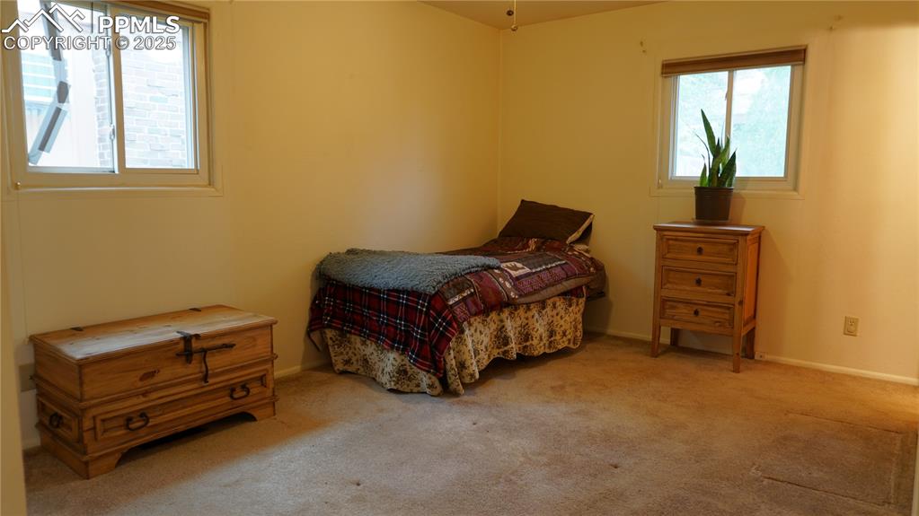 Image 9 of 23: Good sized master bedroom with attached half bathroom