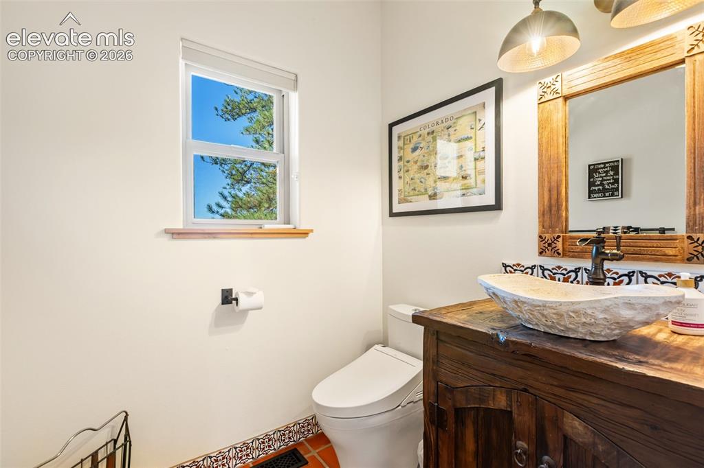 Image 20 of 47: Main floor powder room