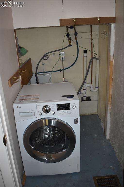 Image 35 of 37: Washroom with washer / clothes dryer