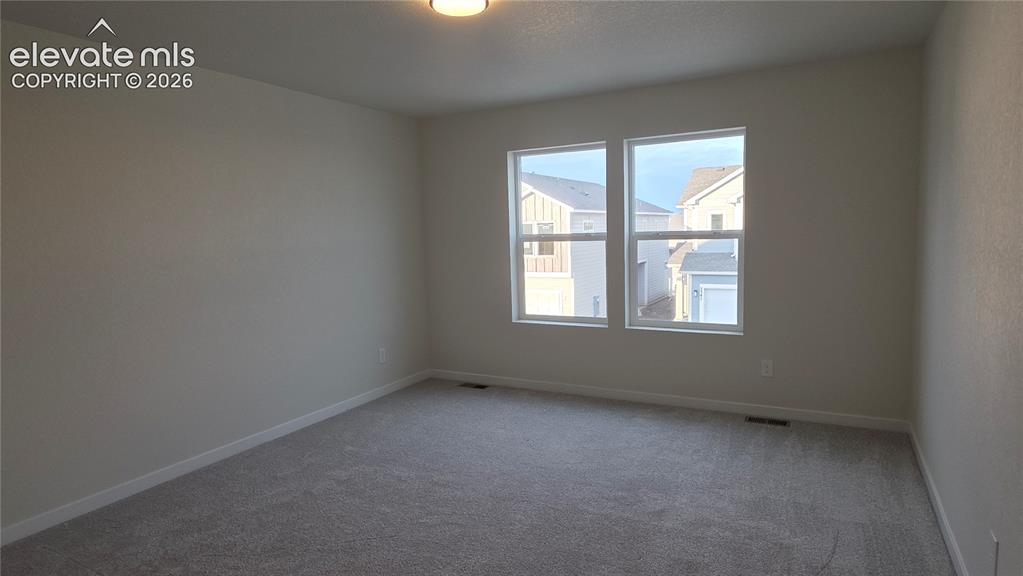 Image 16 of 20: Master Bedroom