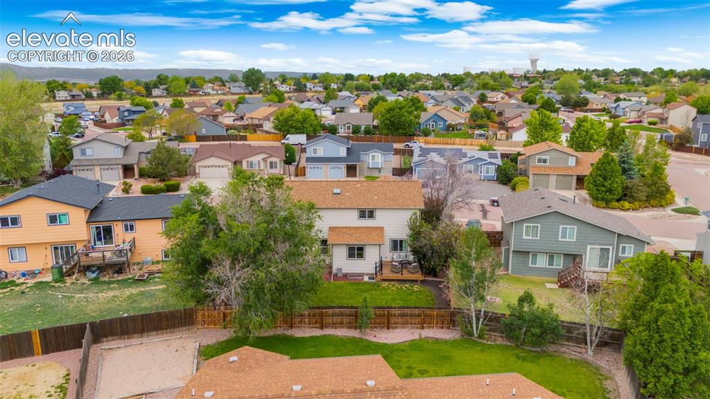 Image 35 of 41: Residential neighborhood featuring a variety of single-family homes with pi