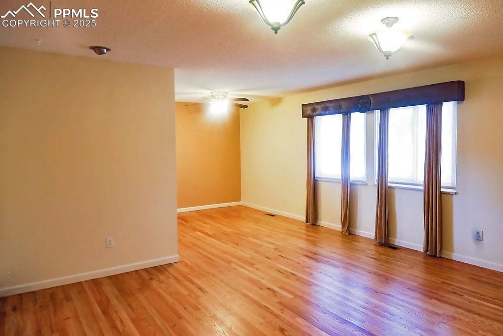 Image 10 of 50: Living Room with Ceiling Fan