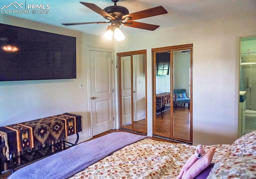 Image 22 of 50: Upper Level Primary Bedroom with Ceiling Fan